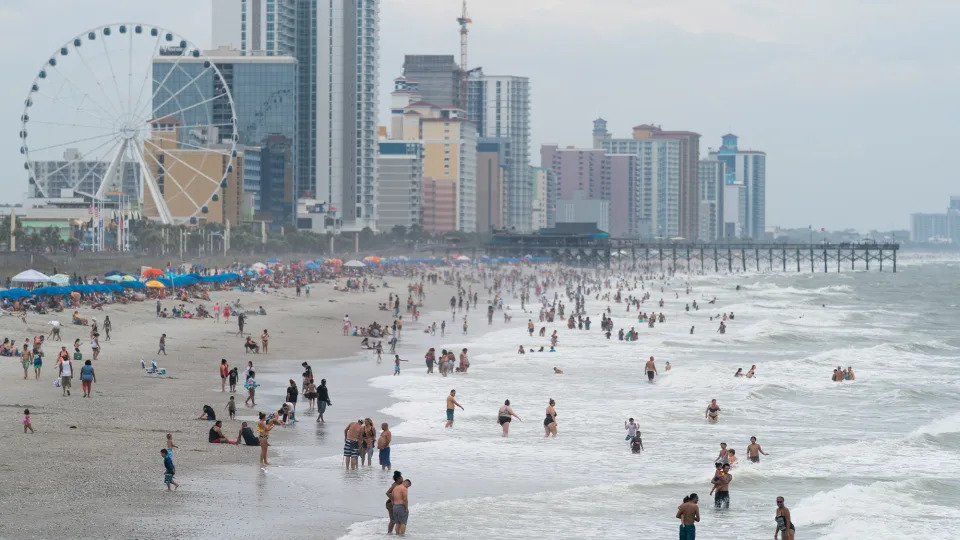 FILE - Crowds enjoy the beach on May 29, 2021 in Myrtle Beach, South Carolina. (Photo by Sean Rayford/Getty Images)