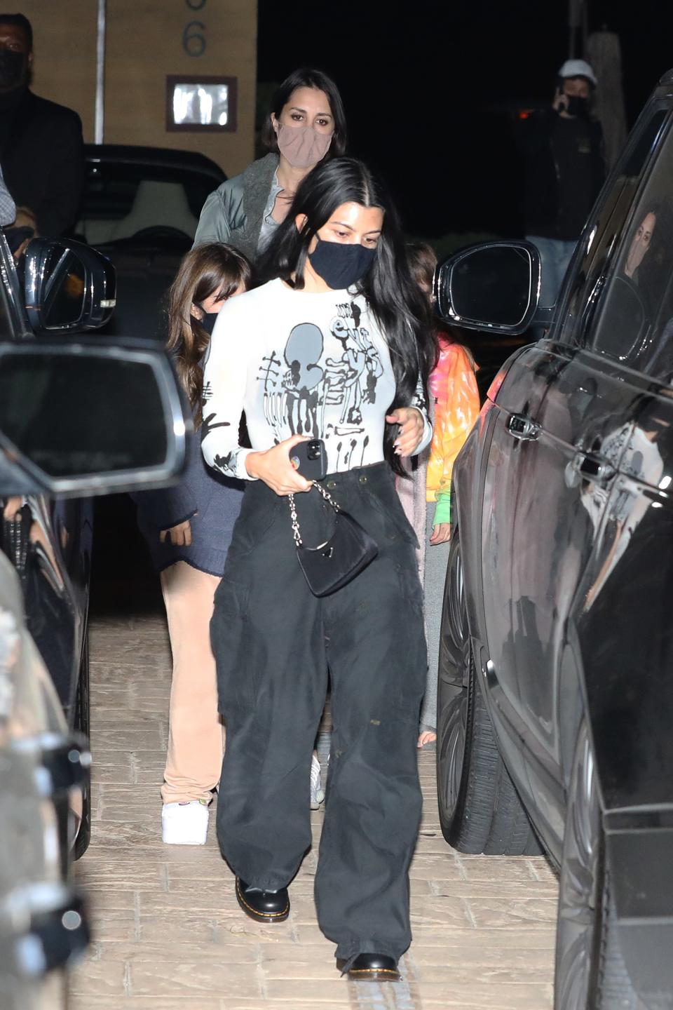 Kourtney Kardashian dines at Nobu Malibu with daughter Penelope Disick and friends in Malibu. 22 Apr 2021 Pictured: Kourtney Kardashian And Penelope Disick. Photo credit: Photographer Group/MEGA TheMegaAgency.com +1 888 505 6342 (Mega Agency TagID: MEGA748833_008.jpg) [Photo via Mega Agency]