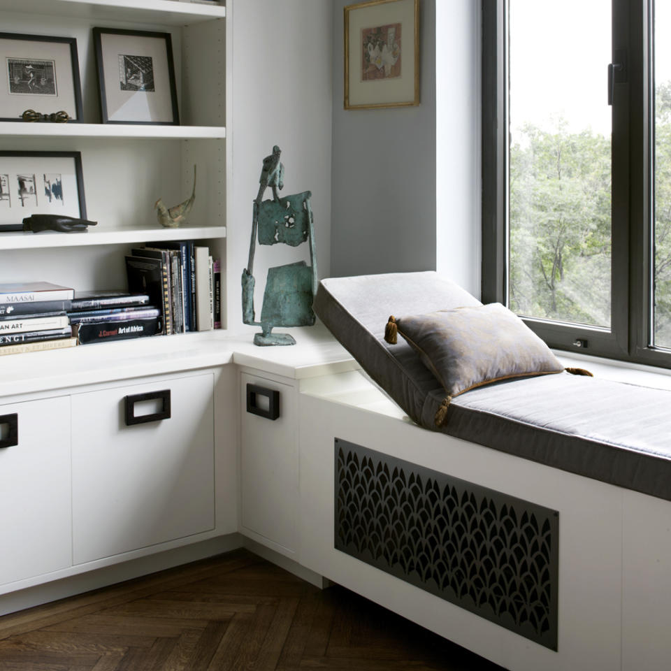 This 2010 photo provided by interior designer Carolyn DiCarlo shows a space created for relaxing and meditation by DiCarlo in this New York home, with a moveable cushion with a view of the outdoors. To capture a space for relaxing, meditation and morning newspaper-reading, DiCarlo created a window seat and nature perch for these clients overlooking the trees in Central Park. (Adam DiCarlo/Carolyn DiCarlo via AP)