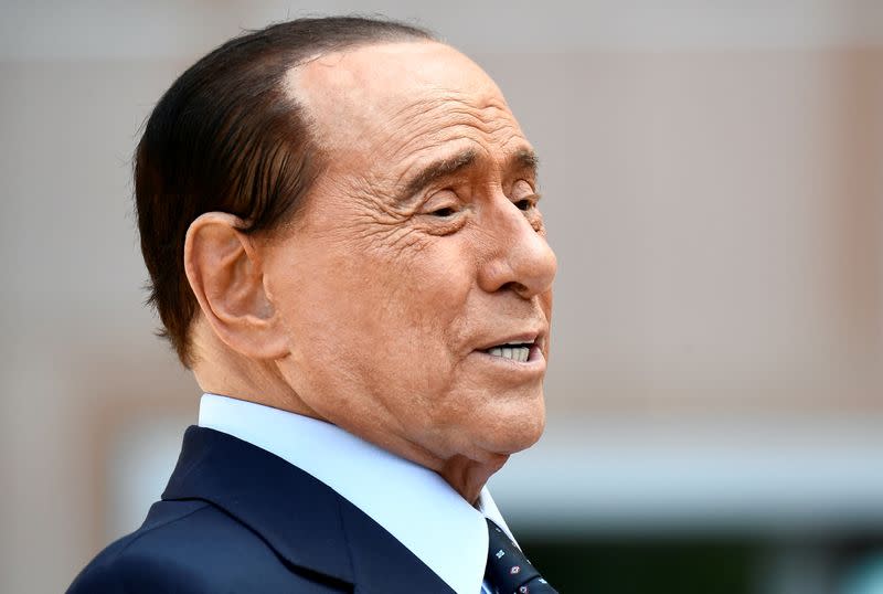 FILE PHOTO: Former Italian Prime Minister Silvio Berlusconi is discharged from Milan's San Raffaele hospital