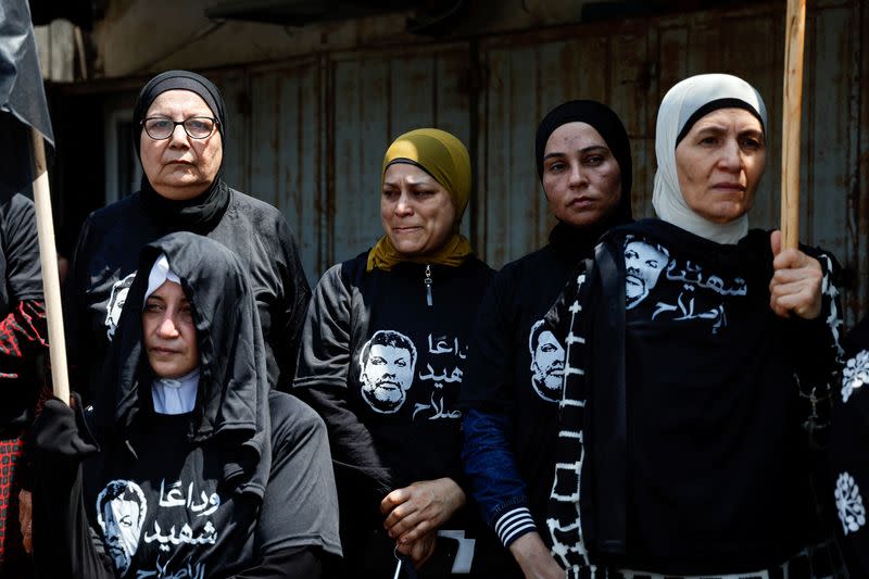 Relatives and friends take part in the funeral of Abdelrahman Kashua, director general of the Arab city of Tira in Israel, who was fatally shot as criminal violence surges in Arab communities, in Tira