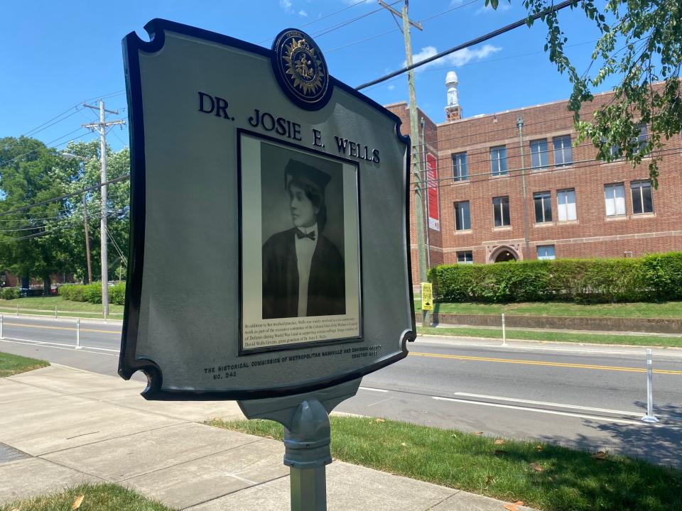 A historical marker unveiled Friday, May 20, 2022 bears a portrait of Dr. Josie E. Wells. It reads: "Dr. Josie in her graduation regalia, 1904. In addition to her medical work, Wells was widely involved in civic community work as part of the executive committee of the Colored Unit of the Women's Council of Defense during World War I and in supporting woman suffrage. She died in 1921 at age 44, and is buried at Nashville's Greenwood Cemetery."