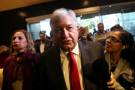 Mexican presidential candidate Andres Manuel Lopez Obrador of the National Regeneration Movement (MORENA) arrives to the presentation of his shadow cabinet for the July 2018 presidential election, in Mexico City, Mexico December 14, 2017. REUTERS/Edgard Garrido