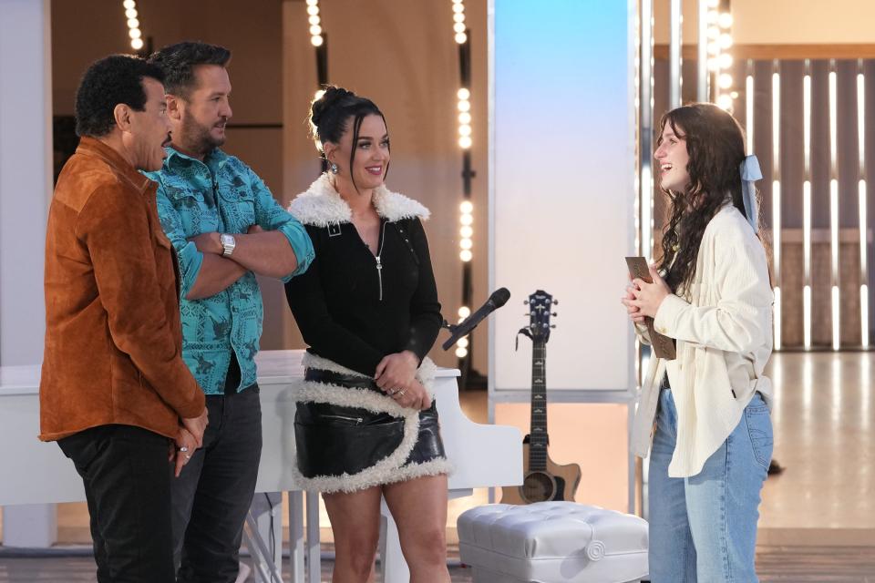 "American Idol" judges (from left) Lionel Richie, Luke Bryan and Katy Perry chat with contestant Abi Carter, of Indio, following her audition.