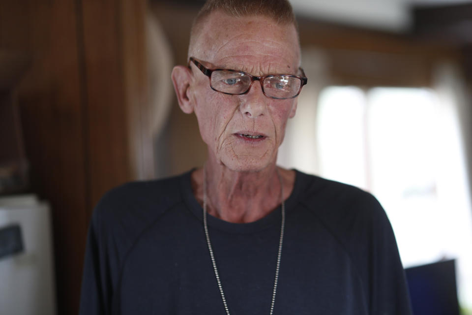 Neil Mahoney is shown inside his trailer home located in a park just below the westbound lanes of Interstate 70 Wednesday, Sept. 4, 2019, in Golden, Colo. Mahoney, who is dying of cancer, has joined forces with his doctor to say that a Colorado hospital's policy barring the doctor from administering life-ending drugs to Mahoney at his home goes against the state's assisted suicide law. (AP Photo/David Zalubowski)