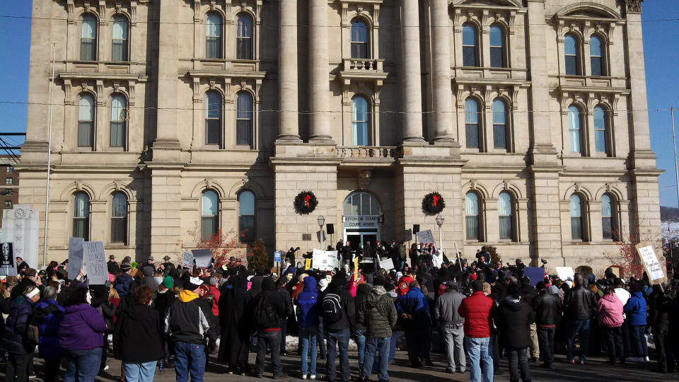 Protesters upset by the local sheriff's handling of a rape case involving two high school football players gathered in front of the Jefferson County courthouse in Steubenville, Ohio, on Jan. 5, 2013. (Photo: Stringer . / Reuters)