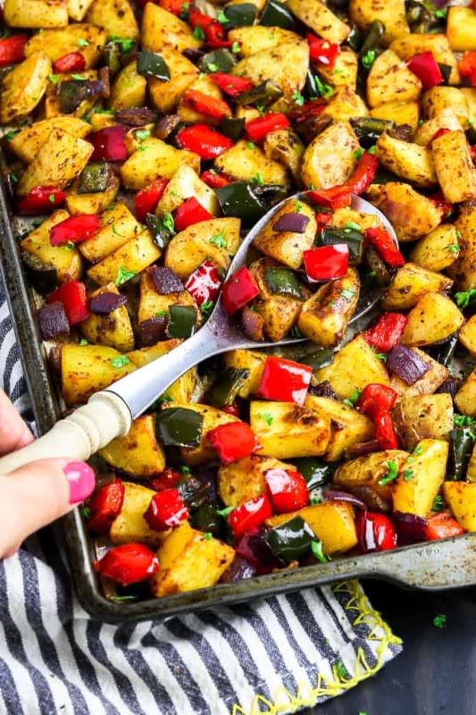 <p>Vegan Huggs</p><p>These Roasted Breakfast Potatoes are full of smoky flavor and require very little effort to make. Everything is roasted all in one pan and done in 30 minutes or less!</p><p><strong>Get the recipe: <a href="https://veganhuggs.com/roasted-breakfast-potatoes/" rel="nofollow noopener" target="_blank" data-ylk="slk:Roasted Breakfast Potatoes;elm:context_link;itc:0;sec:content-canvas" class="link ">Roasted Breakfast Potatoes</a></strong></p>