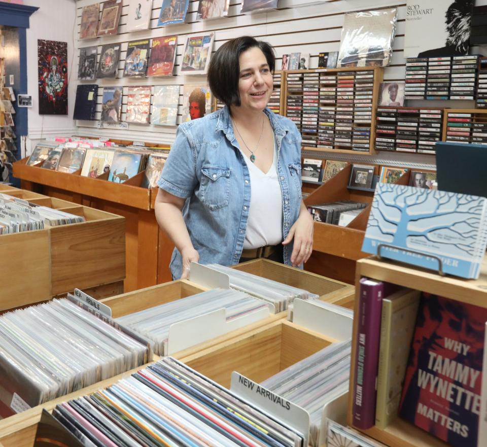 Co-owner Jennifer O'Connor with vinyl records at Main Street Beat in Nyack Sept. 15, 2023.