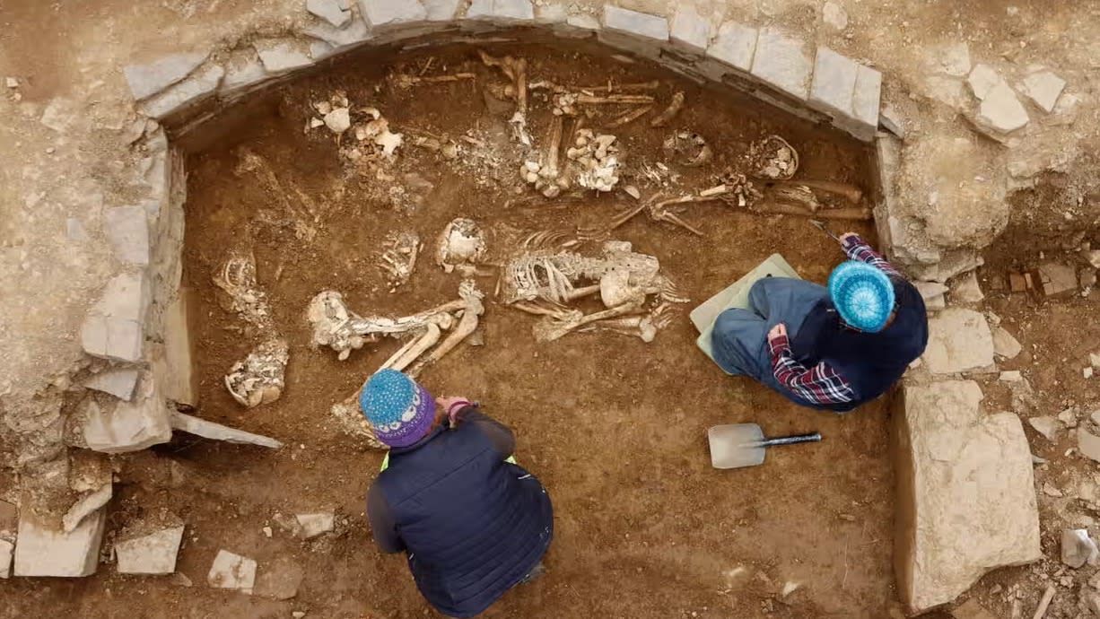  A burial tomb containing skeletons. 