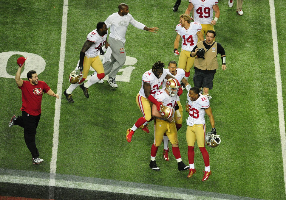 The San Francisco 49ers celebrate after winning the NFC championship in Atlanta on January 20, 2013. (Photo by Scott Cunningham/Getty Images)