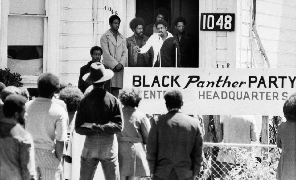 FILE - In this Aug. 13, 1971, file photo, Bobby Seale, chairman of the Black Panther Party, addresses a rally outside the party headquarters in Oakland, Calif., urging members to boycott certain liquor stores. (AP Photo/File)