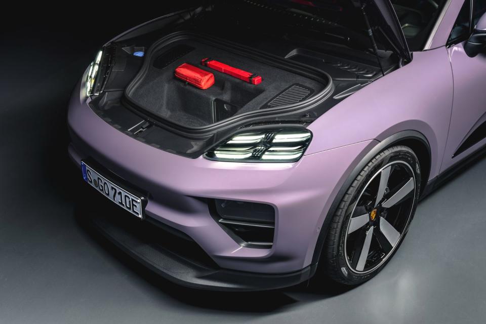 2024 porsche macan ev in pastel colors under a photo studio