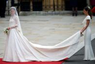 <p>Middleton wore this iconic Sarah Burton for Alexander McQueen gown that inspired brides around the world.</p>