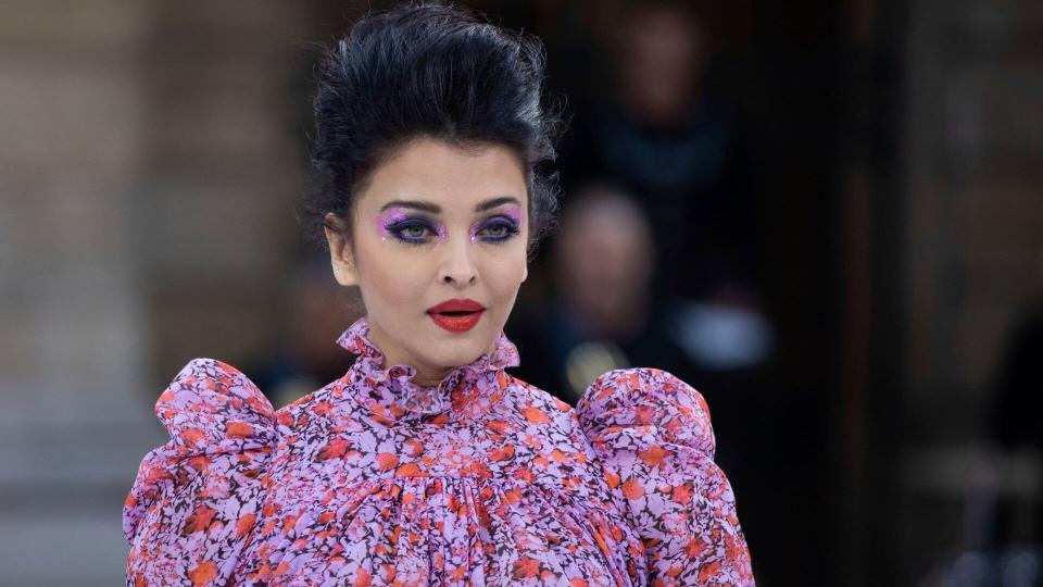 Mandatory Credit: Photo by Vianney Le Caer/Invision/AP/Shutterstock (10429064ed)Aishwarya Rai Bachchan blows a kiss as she wears a creation as part of the L'Oreal Ready To Wear Spring-Summer 2020 collection, unveiled during the fashion week, in ParisFashion S/S 2020 L'Oreal, Paris, France - 28 Sep 2019.