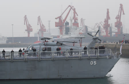 The Royal Australian Navy's Adelaide class guided missile frigate HMAS Melbourne (III) arrives at Qingdao Port for the 70th anniversary celebrations of the founding of the Chinese People's Liberation Army Navy (PLAN), in Qingdao, China, April 21, 2019. REUTERS/Jason Lee