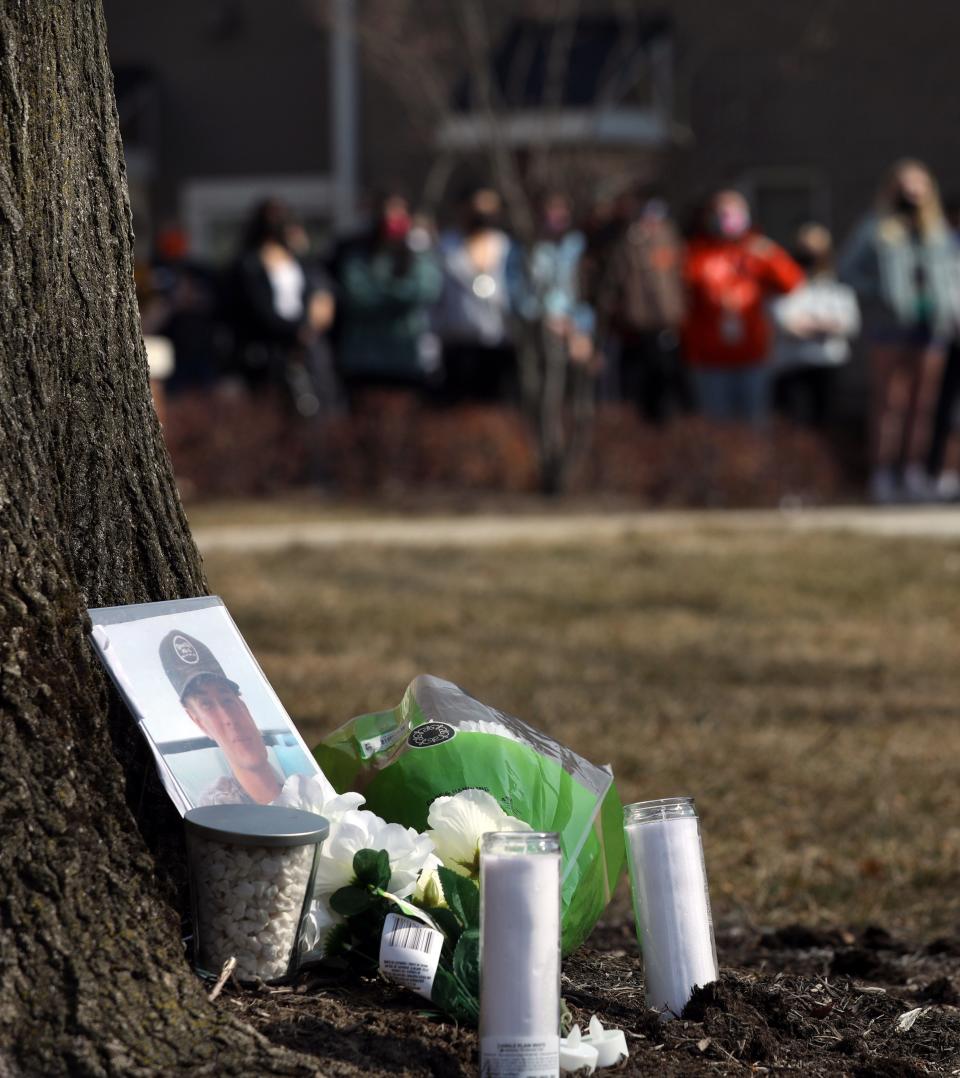 A makeshift memorial for Stone J. Foltz, 20, of Delaware, Ohio, is outside of Pi Kappa Alpha at Bowling Green State University where BGSU students gathered for a protest on Tuesday, March 9, 2021. Foltz died Sunday, three days after an alleged off-campus hazing incident.THE BLADE/AMY E. VOIGT