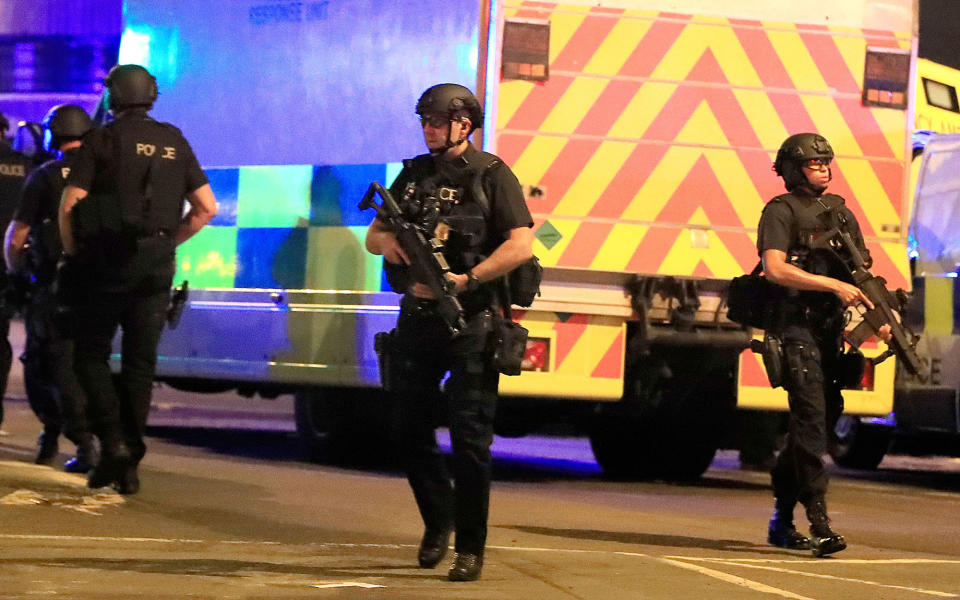 <p>Armed police respond after reports of an explosion at Manchester Arena during an Ariana Grande concert in Manchester, England, Monday, May 22, 2017. Several people have died following reports of an explosion Monday night at the concert in northern England, police said. A representative said the singer was not injured. (Peter Byrne/PA via AP) </p>