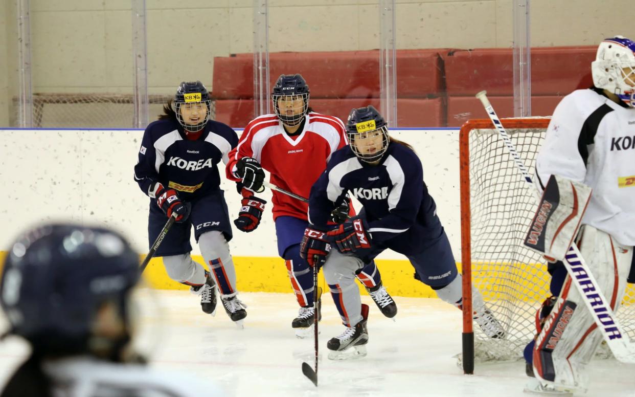 Ice hockey players from North and South Korea train together for the first time at Jincheon National Training Centre - REUTERS