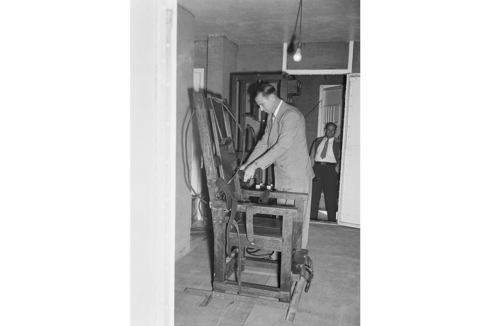 FILE - An unidentified attendant checks Louisiana's portable electric chair in the parish jail at St. Martinville, La. on May 9, 1947. In Louisiana, around 60 people currently sit on death row, but an execution hasn't occurred since 2010. Between a conservative governor and a new execution method, there has been a renewed push to find alternatives to lethal injection. (AP Photo/Bill Allen, File)
