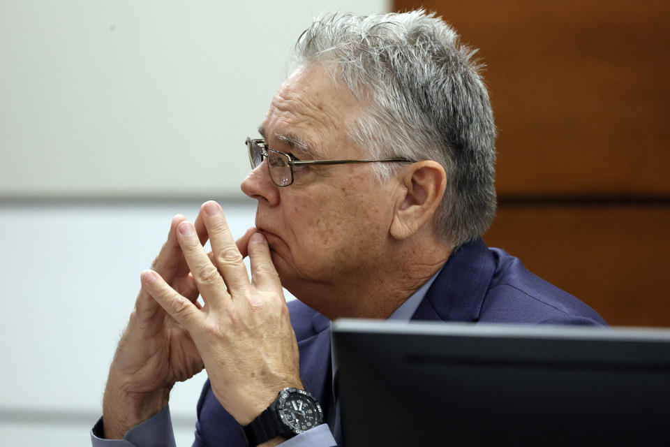 Former Marjory Stoneman Douglas High School School Resource Officer Scot Peterson sits at the defense table during his trial, Thursday, June 8, 2023, at the Broward County Courthouse in Fort Lauderdale, Fla. Peterson is charged with child neglect and other charges for failing to stop the Parkland school massacre five years ago. (Amy Beth Bennett/South Florida Sun-Sentinel via AP, Pool)