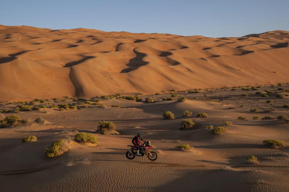 Kevin Benavides of Argentina rides his Honda motorbike during stage eleven of the Dakar Rally between Shubaytah and Haradth, Saudi Arabia, Thursday, Jan. 16, 2020. (AP Photo/Bernat Armangue)