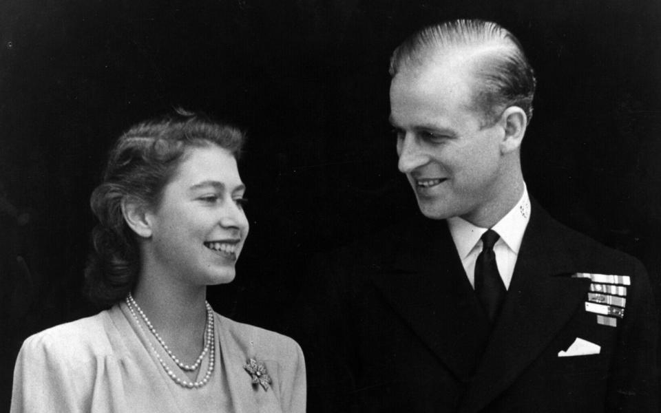 The Queen, then-HRH Princess Elizabeth and Philip Mountbatten, Duke of Edinburgh, on the occasion of their engagement at Buckingham Palace in London 1947 -  Fox Photos/Getty Images