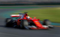 Formula One - F1 - Australian Grand Prix - Melbourne, Australia - 26/03/17 Ferrari driver Sebastian Vettel of Germany drives on his way to win the Australian Formula One Grand Prix. REUTERS/Jason Reed