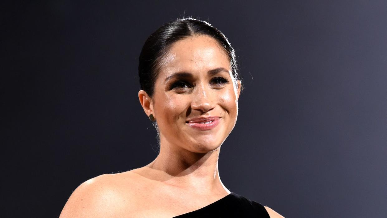 Meghan, Duchess of Sussex on stage during The Fashion Awards 2018 