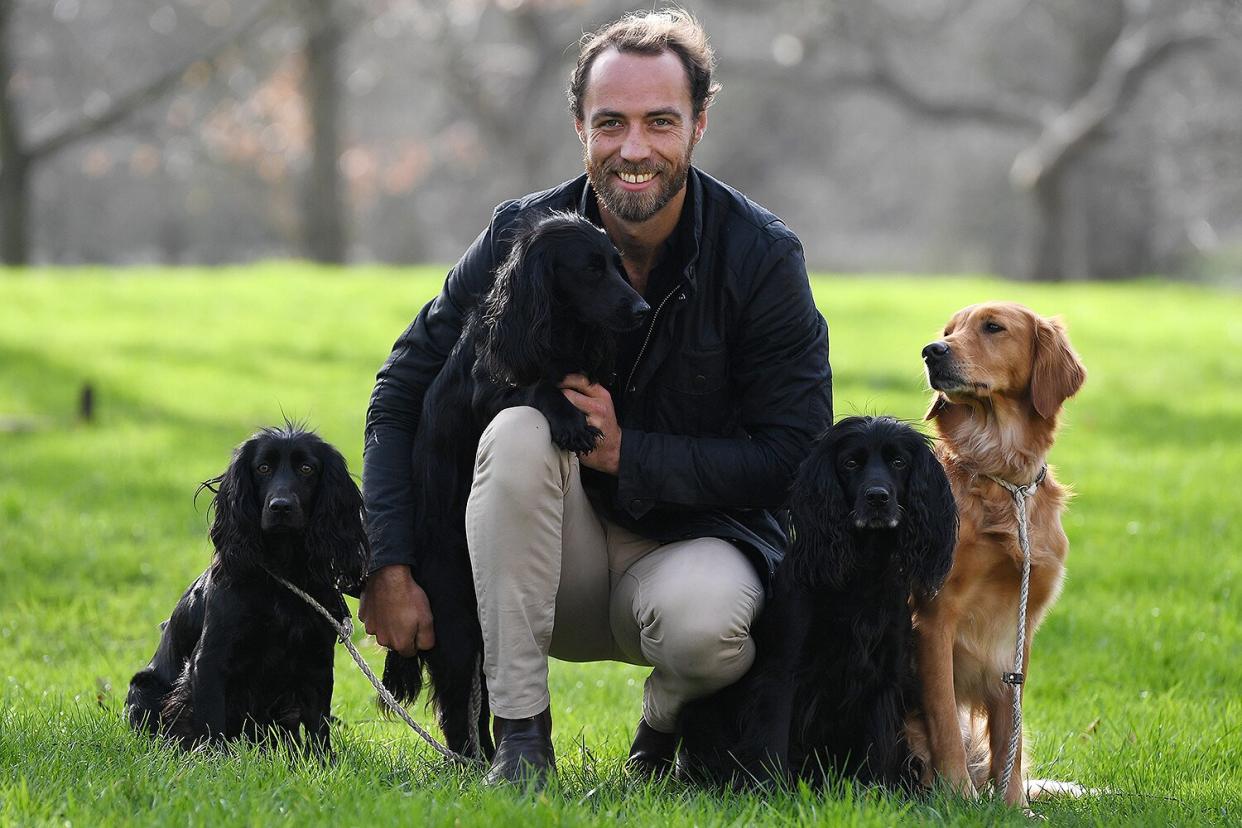 James Middleton poses for a photograph with his dogs Inka, Luna, Ella and Mabel at a launch event for this year's Crufts and Friends for Life in Green Park, London.