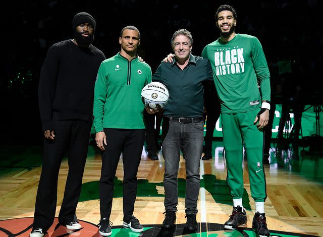 <p>Brian Babineau/NBAE/Getty</p> Jaylen Brown, Joe Mazzulla, Wyc Grousbeck, and Jayson Tatum are honored for their NBA All Star 2023 nominations before the game against the Detroit Pistons on February 15, 2023.