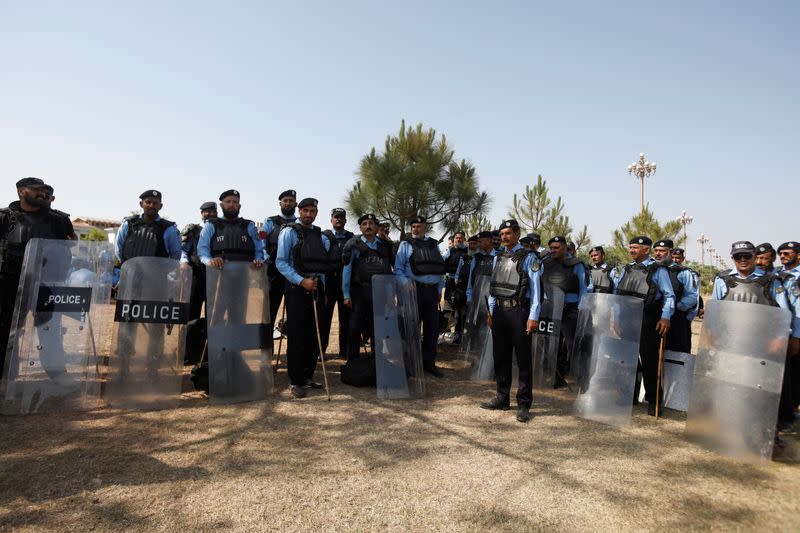 Deployed police officers gather at Red Zone for security measures in Islamabad