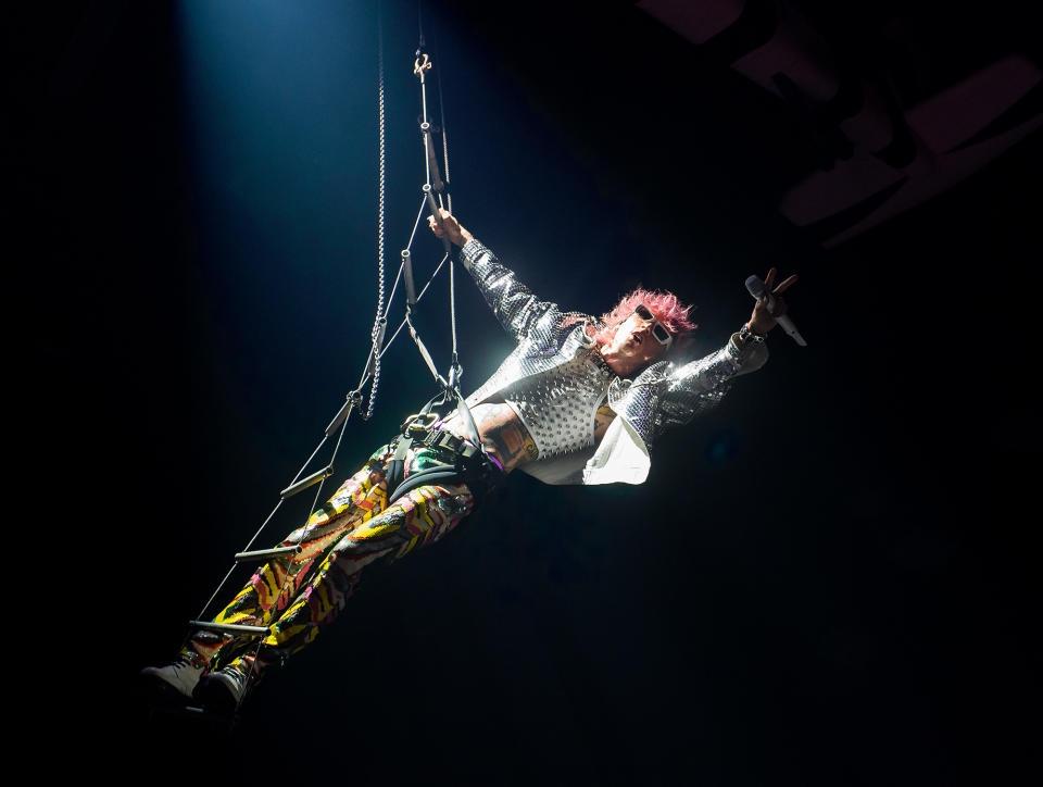 <p>Another day, another high-flying concert for Machine Gun Kelly, who sails over the crowd at OVO Arena Wembley in London on Oct. 1. </p>