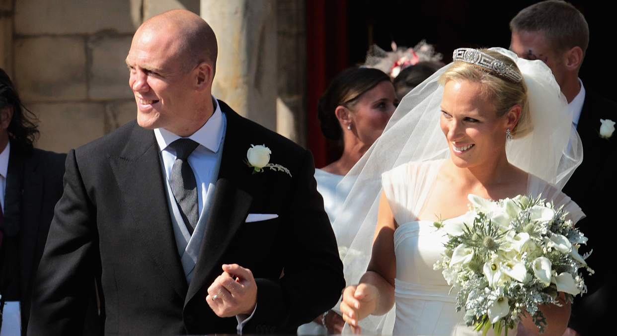 Zara Phillips and Mike Tindall attend their wedding at Canongate Kirk, in Edinburgh on July 30, 2011 in Edinburgh, Scotland.