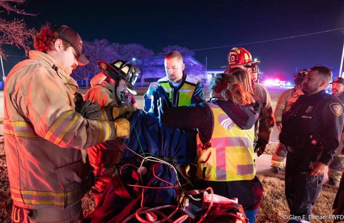 Four Fort Worth firefighters were injured in a crash early Tuesday morning, Feb. 6, 2024, when their truck rolled over while they were responding to a call. Two of the firefighters remain hospitalized, one in critical condition and one stable, the fire department said.