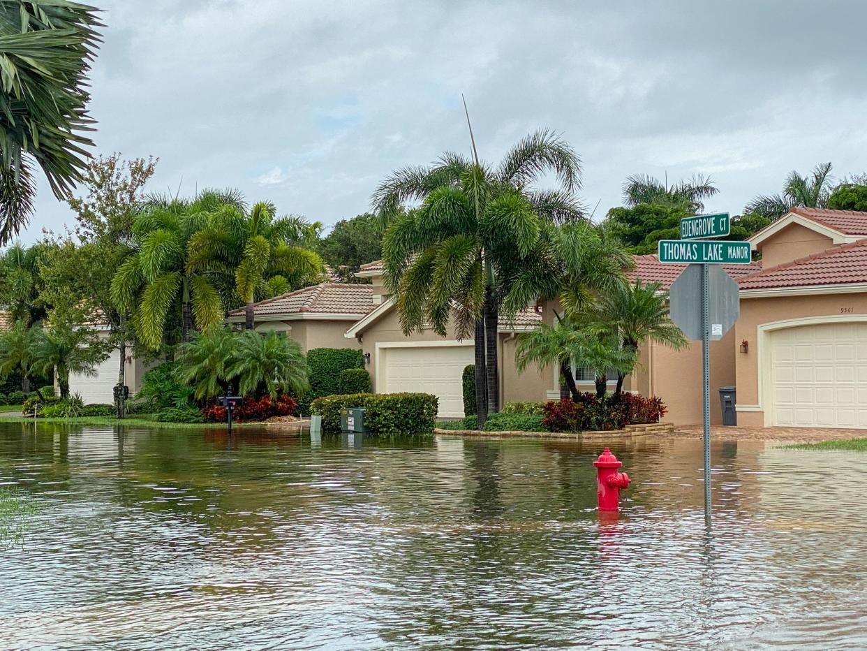 Flooded streets in a Southern Florida suburban residential community.