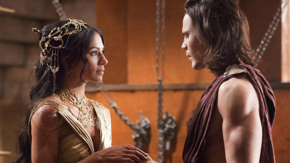 Taylor Kitsch and Lynn Collins in John Carter