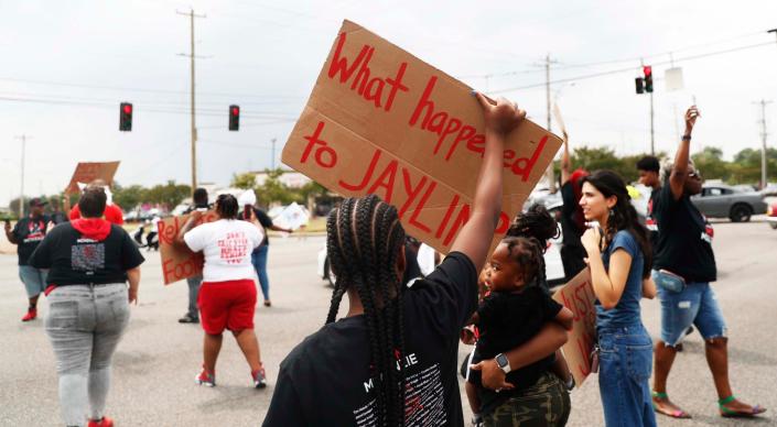 The family and friends of Jaylin McKenzie, a 20-year-old who was killed after a Memphis Police Department traffic stop in December 2022, staged a protest on June 10, 2023 at the intersection of American Way and S Perkins Road in Memphis, Tenn.