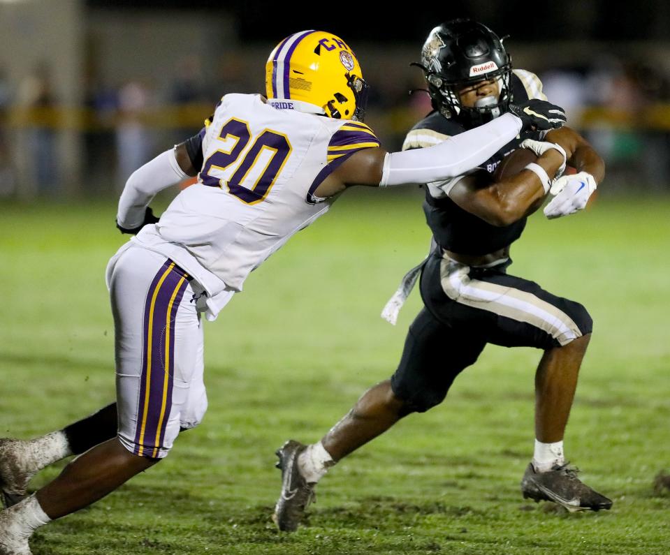 A Buchholz Bobcats receiver out-maneuvers a Columbia Tigers defender during the opening football game of the season at Citizens Field in Gainesville on Aug. 25.
