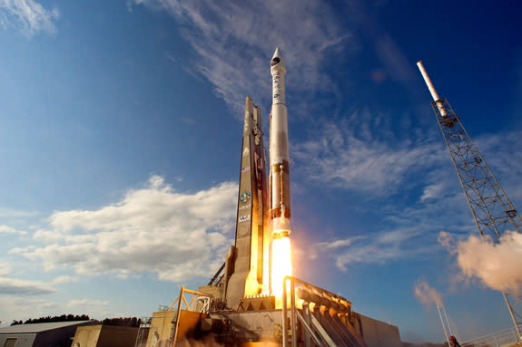 A United Launch Alliance Atlas 5 rocket blasts off from Space Launch Complex-41 at Cape Canaveral Air Force Station carrying the second Space-Based Infrared System (SBIRS) GEO-2 satellite for the U.S. Air Force at 5:21 p.m. EDT on March 19, 201