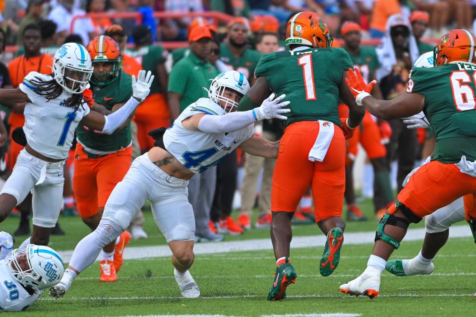UWF's Walker Robinson (44) attempts to bring down Florida A&M University running back Jaquez Yant during the Argos' 31-10 loss at Ken Riley Field at Bragg Memorial Stadium on Saturday, Sept. 16, 2023.