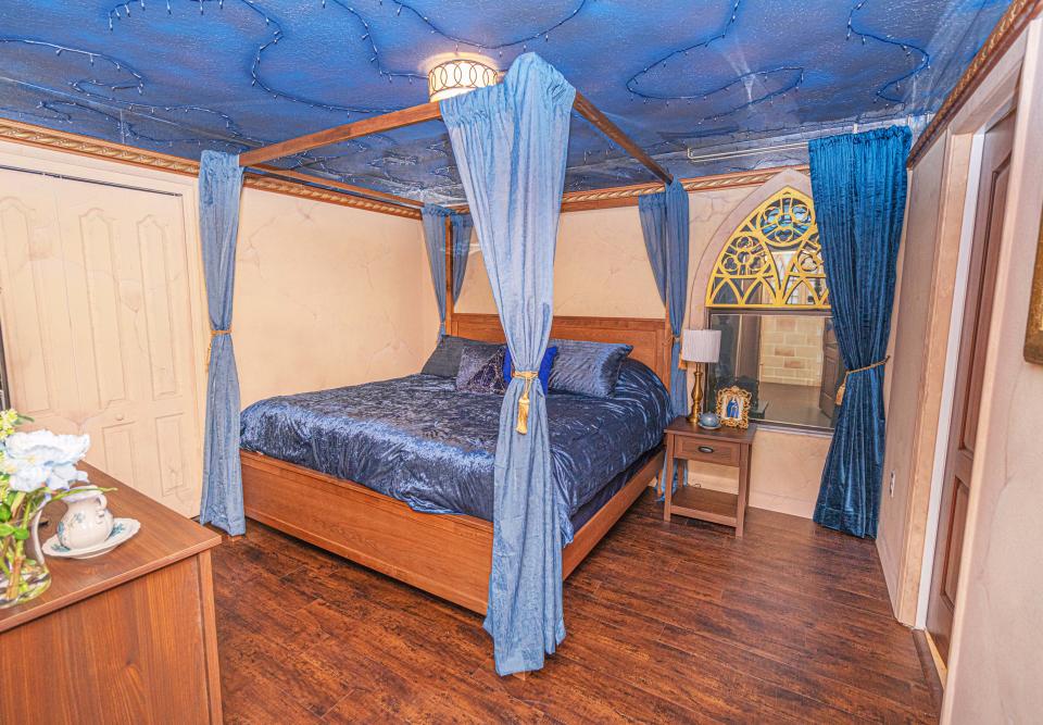 PIC BY @LOMA HOMES / CATERS NEWS AGENCY (PICTURED- A Bedroom with a four-poster-bed ) - Harry Potter fans looking for a first post-lockdown trip can put this place at the top of their list - a night in a Hogwarts- themed Airbnb. The eight-bedroom home, called â Wizardâs Wayâ is based in Florida, US, near the Universal Orlando Resort. There are rooms based on the four houses Gryffindor, Hufflepuff, Ravenclaw, and Slytherin and each bathroom has its own Harry Potter theme, from Hedwig and the  Ministry of Magic to Dobby, and Sirius Black. One of the bedrooms  features an interactive car-shaped bed which is inspired by the scene where Harry and Ron get stuck in the Willow Tree of the second part of the film series. - SEE CATERS COPY