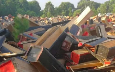 Authorities took coffins from villagers’ homes, piled them up in extraordinary scenes and then had them destroyed