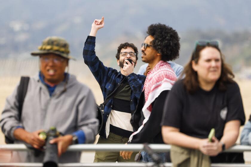 Santa Monica, CA - February 25: A protest taking place during celebrity arrivals at the Independent Spirit Awards hosted by Aidy Bryant in Santa Monica Pier in Santa Monica, CA, Sunday, Feb. 25, 2024. (Jason Armond / Los Angeles Times)