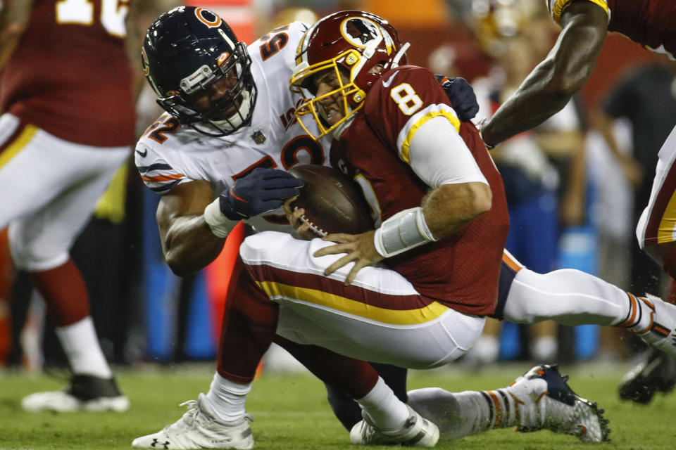 Chicago Bears linebacker Khalil Mack (52) hits Washington Redskins quarterback Case Keenum (8). (AP)