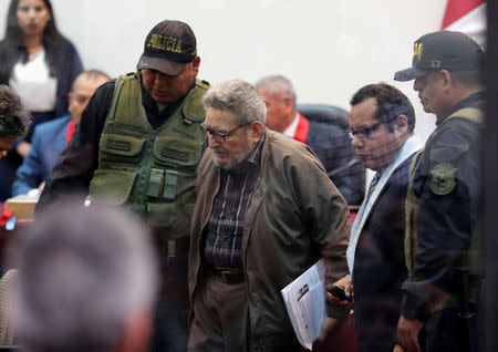 Shining Path founder Abimael Guzman attends a trial during sentence of a 1992 Shining Path car bomb case in Miraflores, at a high security naval prison in Callao, Peru September 11, 2018. REUTERS/Mariana Bazo