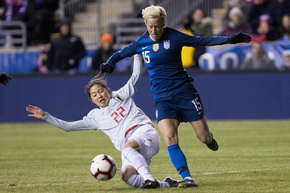 Megan Rapinoe (15) battles Japanese defender Risa Shimizu for possession during both teams' SheBelieves Cup opener at Talen Energy Stadium. (USA TODAY Sports)