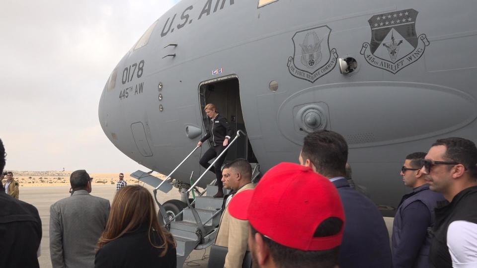 Samantha Power, Administrator of the U.S. Agency for International Development (USAID) steps down from a U.S. military plane carrying aid for people in the Gaza Strip and West Bank after it arrived in El-Arish, Egypt, Dec. 5, 2023. / Credit: CBS News/Ahmed Shawkat
