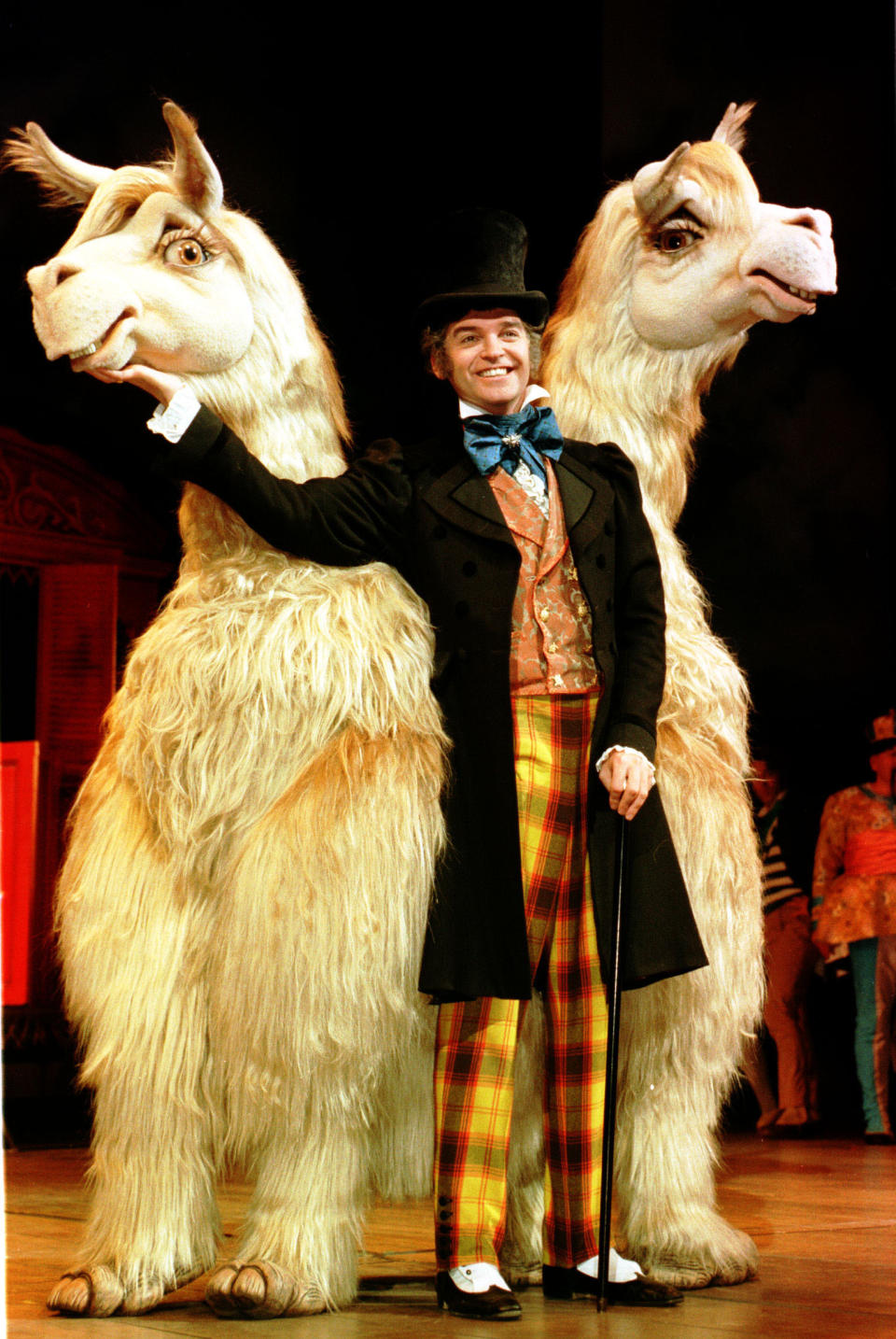 PA NEWS PHOTO 9/7/98 THE MYTHICAL CREATURE 'PUSHMI-PULLYU' ON STAGE WITH PHILLIP SCHOFIELD, WHO PLAYS THE TITLE ROLE IN THE NEW PRODUCTION OF THE CLASSIC STORY 'DR DOLITTLE', SHOWING AT THE APOLLO THEATRE IN LONDON.