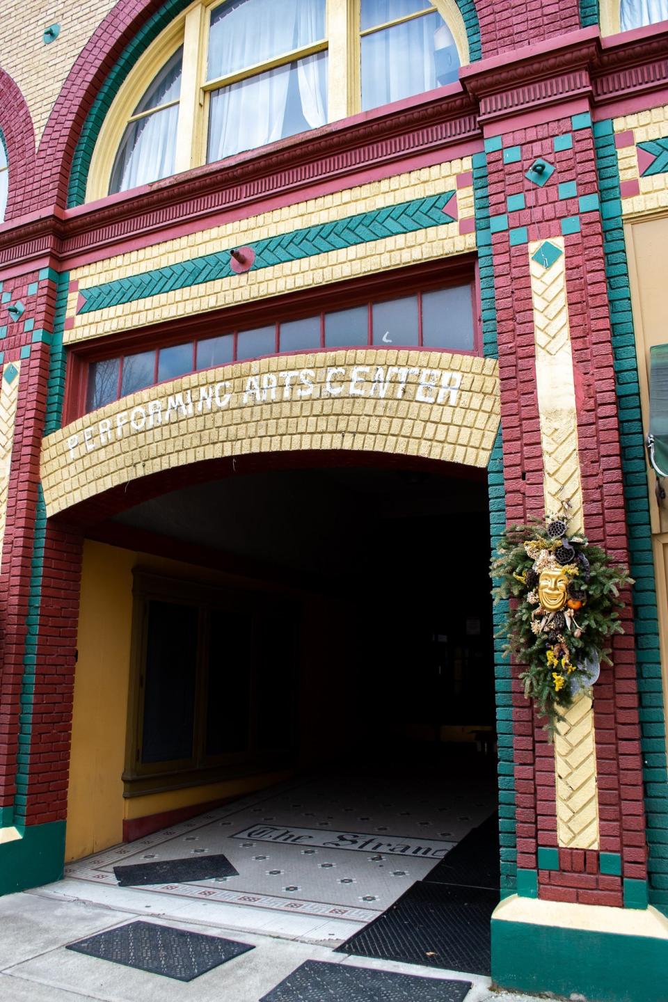 The colorful entrance to the Strand Theater on Wheeling Avenue. This was once a popular date night destination for John and Annie Glenn. The theater was once the Orpheum and also the Avenue theaters. A large-scale effort to repair and save the theater has been taken on by its board of directors and a group of volunteers.