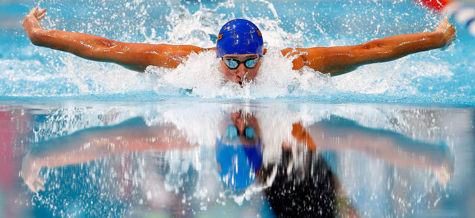 Ryan Lochte competes in the first semifinal heat of the Men's 100 m Butterfly during Day Six of the 2012 U.S. Olympic Swimming Team Trials at CenturyLink Center on June 30, 2012 in Omaha, Nebraska. (Photo by Jamie Squire/Getty Images)